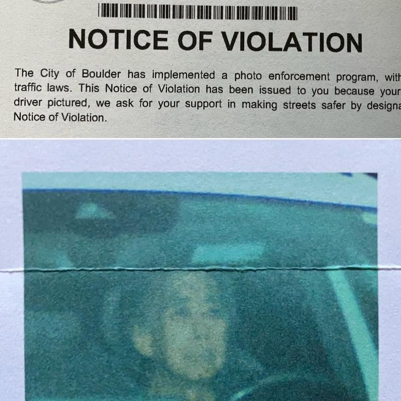 Notice of Violation issued by the City of Boulder, detailing a photo enforcement program for traffic laws, featuring an image of a driver.