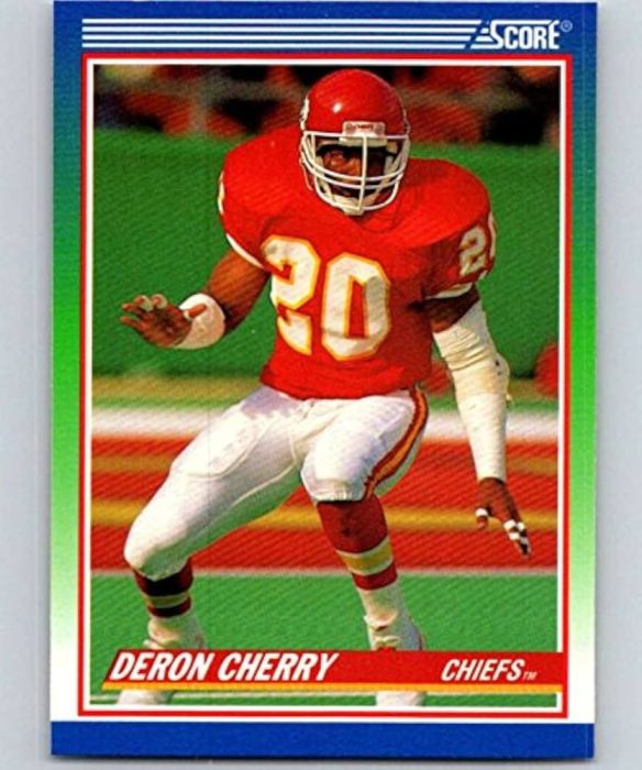 Football trading card featuring a player in a red uniform with the number 20, representing the Kansas City Chiefs.
